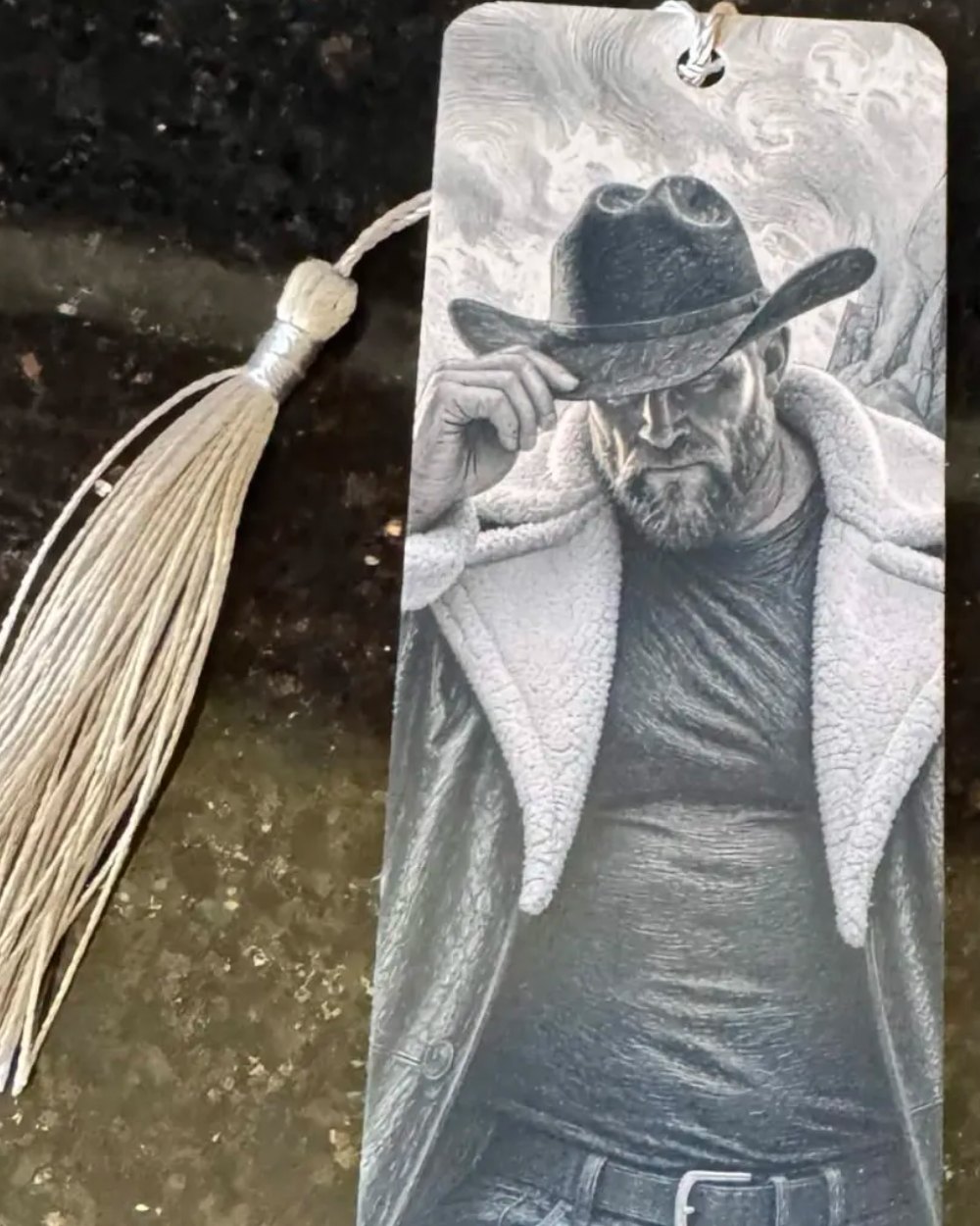 Cal bookmark with a silver tassel.